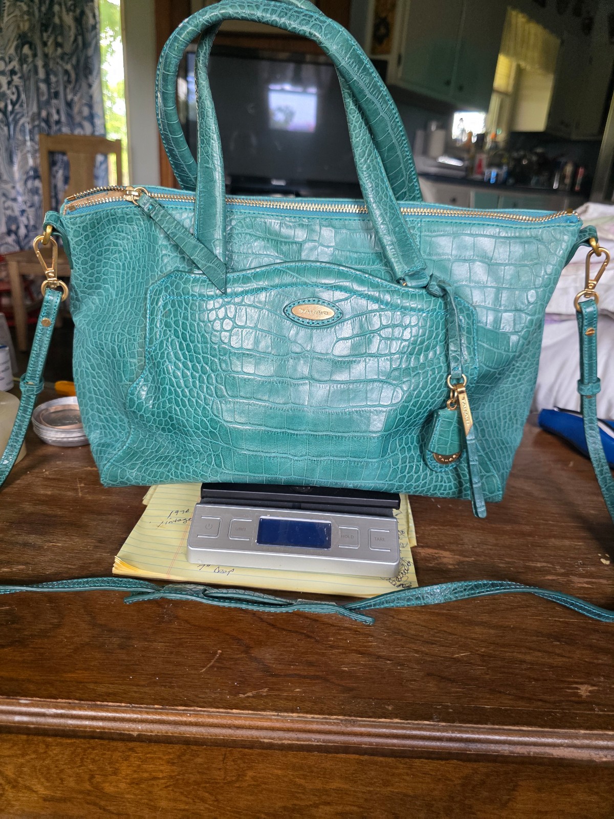 tahari crossbody handbag. It is a great greenish teal leather bag
