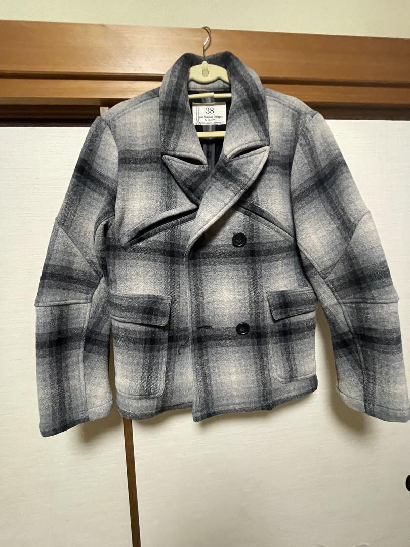 Grey and white checked peacoat.