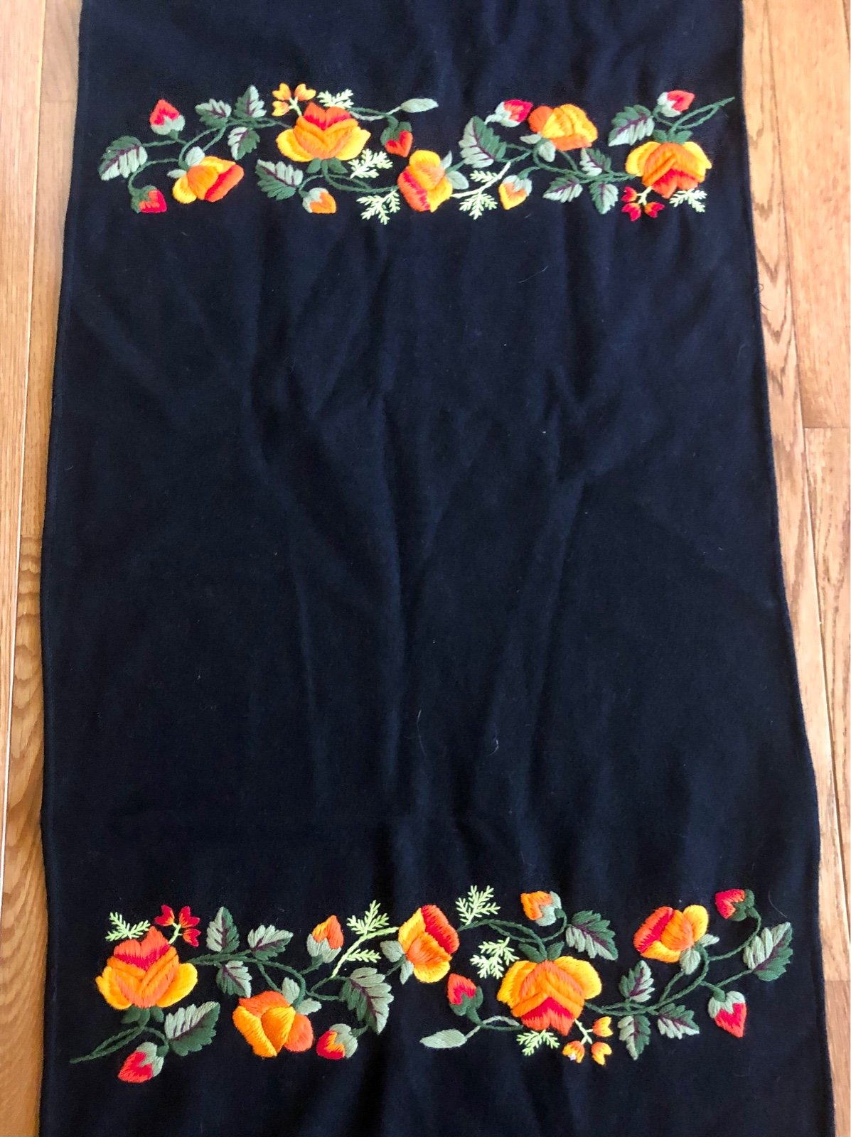 Black felt and hand stitched approximately 18x77”table runner
