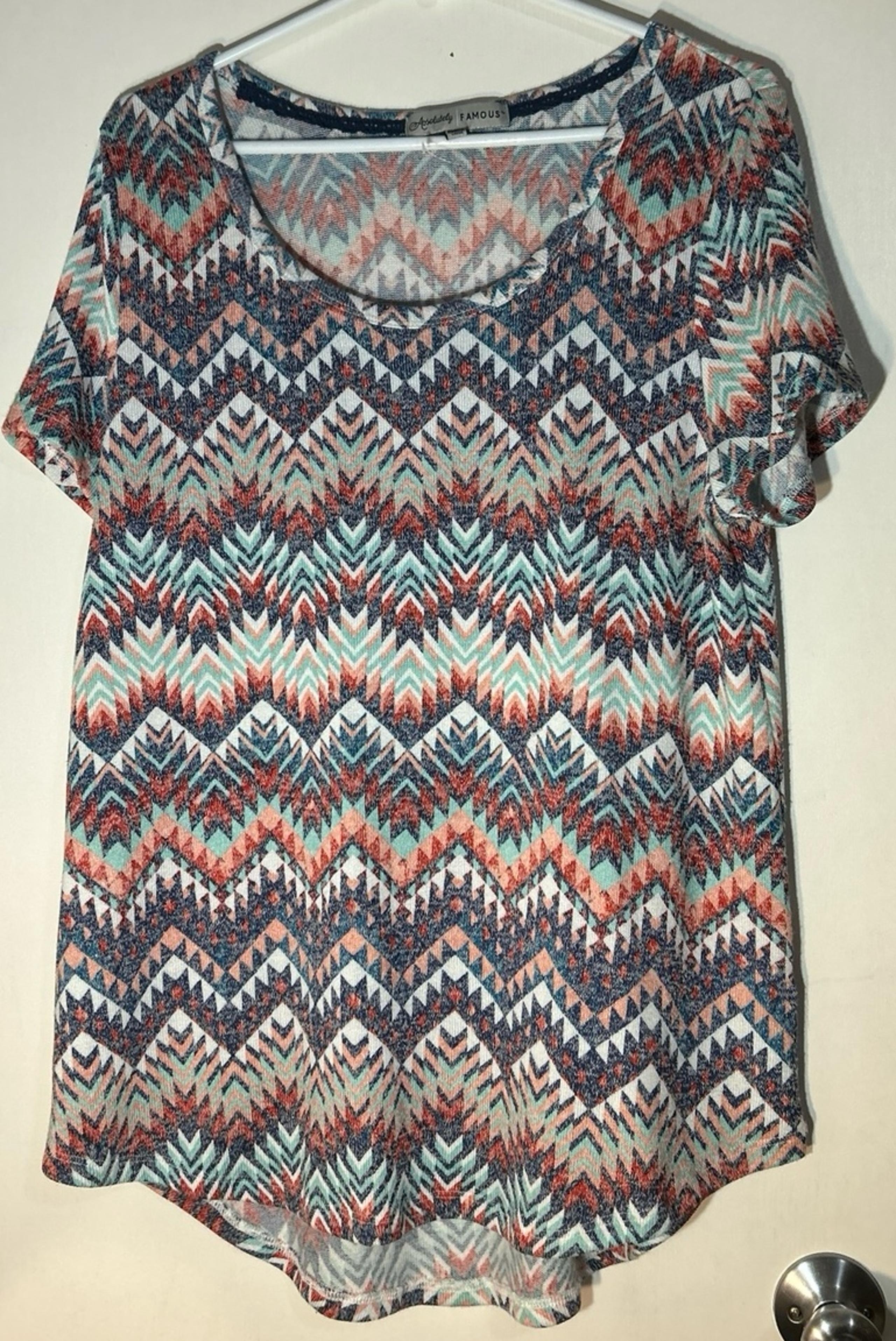 Women’s XL multi colored blouse. Like New. Absolutely Famous