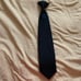 Vest, pants,and tie