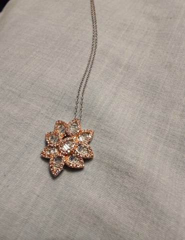 Bella Luce pink and white diamond simulants, rhodium over sterling silver pendan