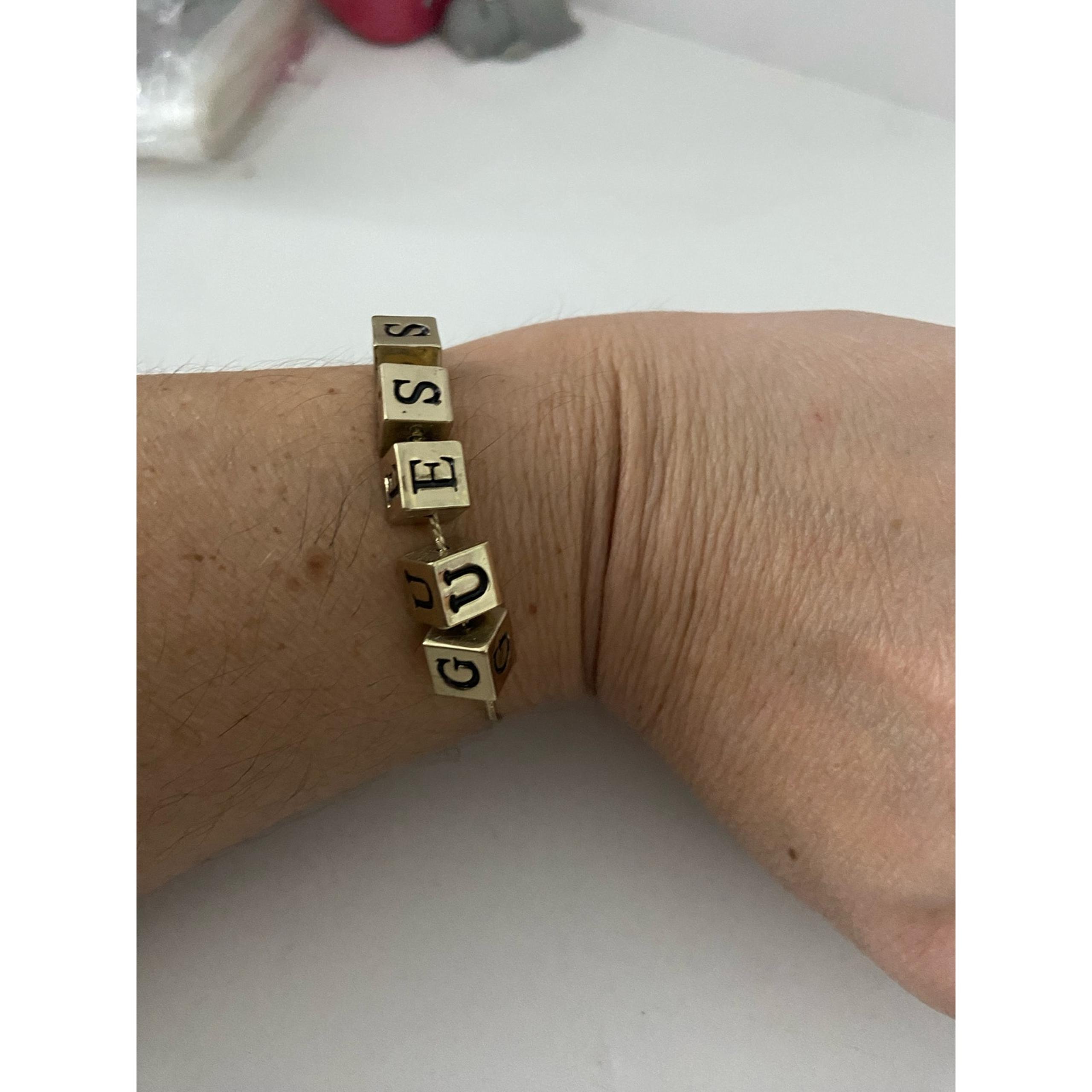 Guess charm bracelet gold tone