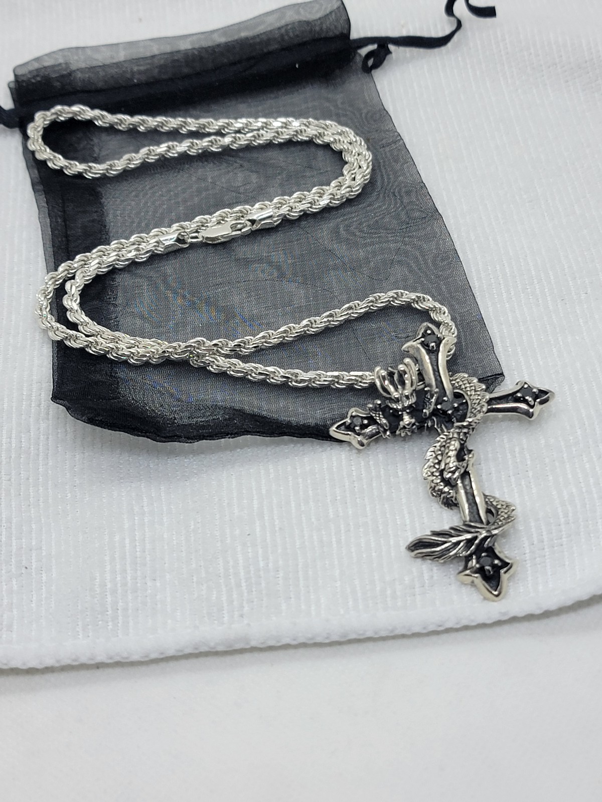 925 silver 2.9 cross with a dragon wrapped around it on a 925 silver rope