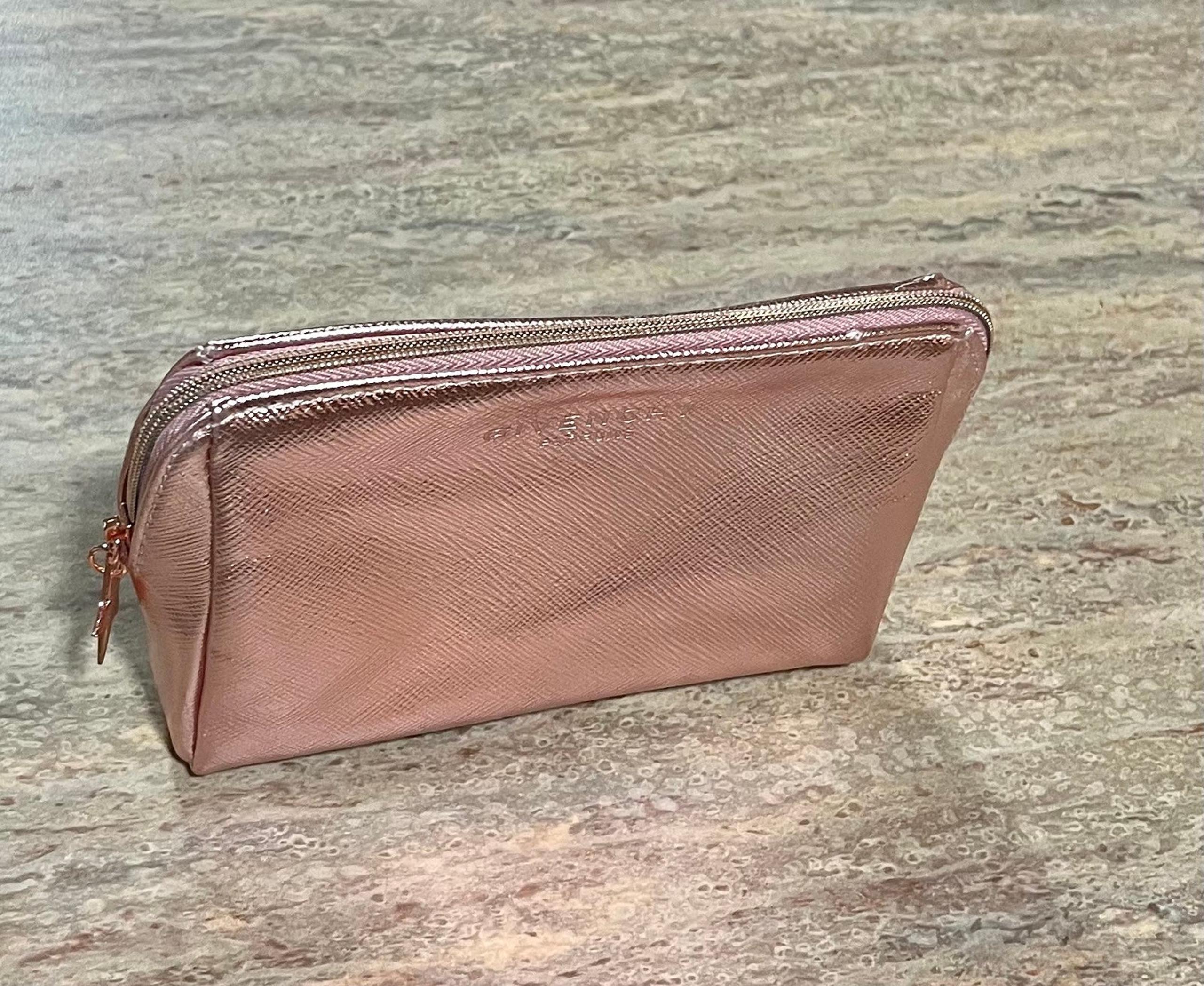 Givenchy Parfums metallic pink cosmetic bag