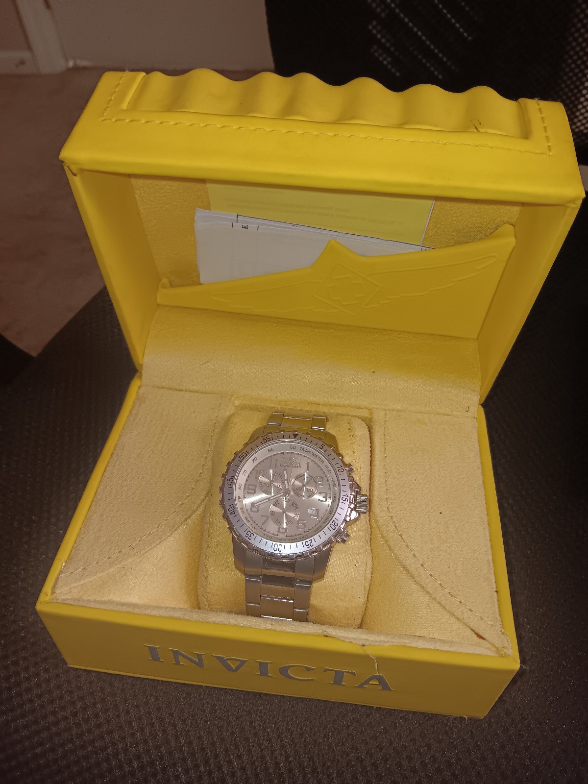 Invicta 6620 with instructions and registration papers.