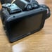 JVC GC-JY40 HD camcorder with body, USB cable, and charging cable included.
