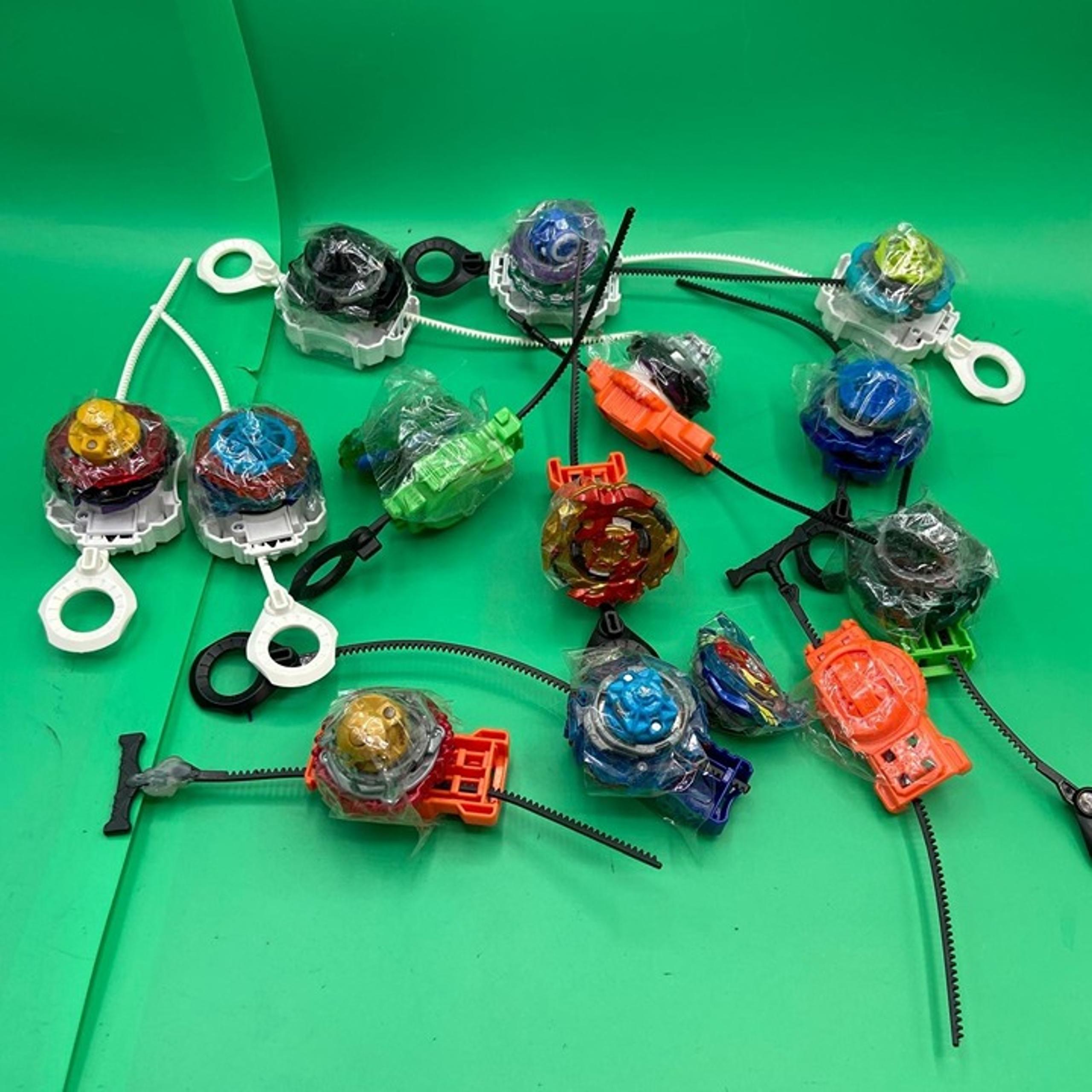 Lot of 12 BeyBlades Con Discos Y Lanzadores.