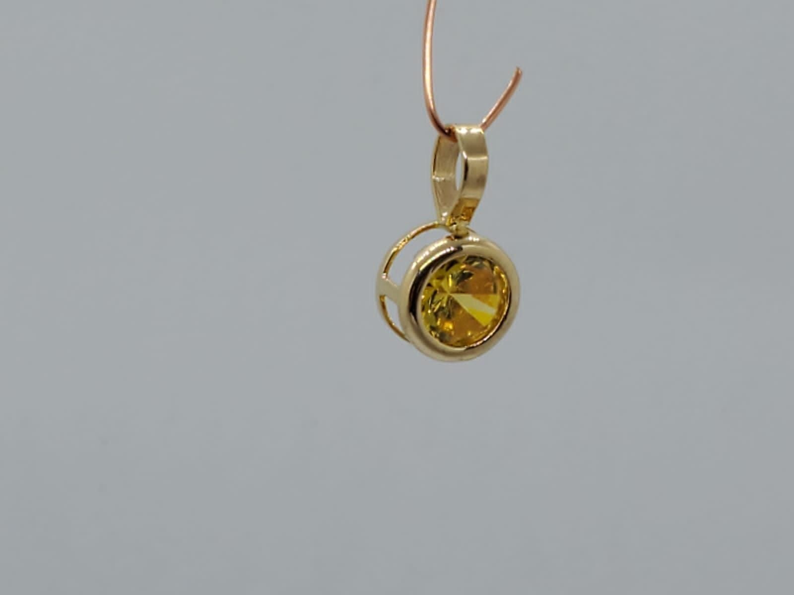 14k yellow gold pendant drummer style