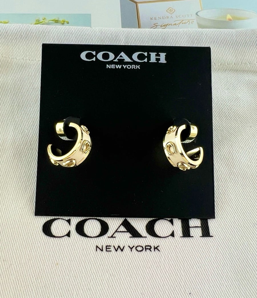 Coach pegged C Chalk white enamel huggie gold earrings