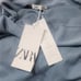 Zara offers the shoulder blue top