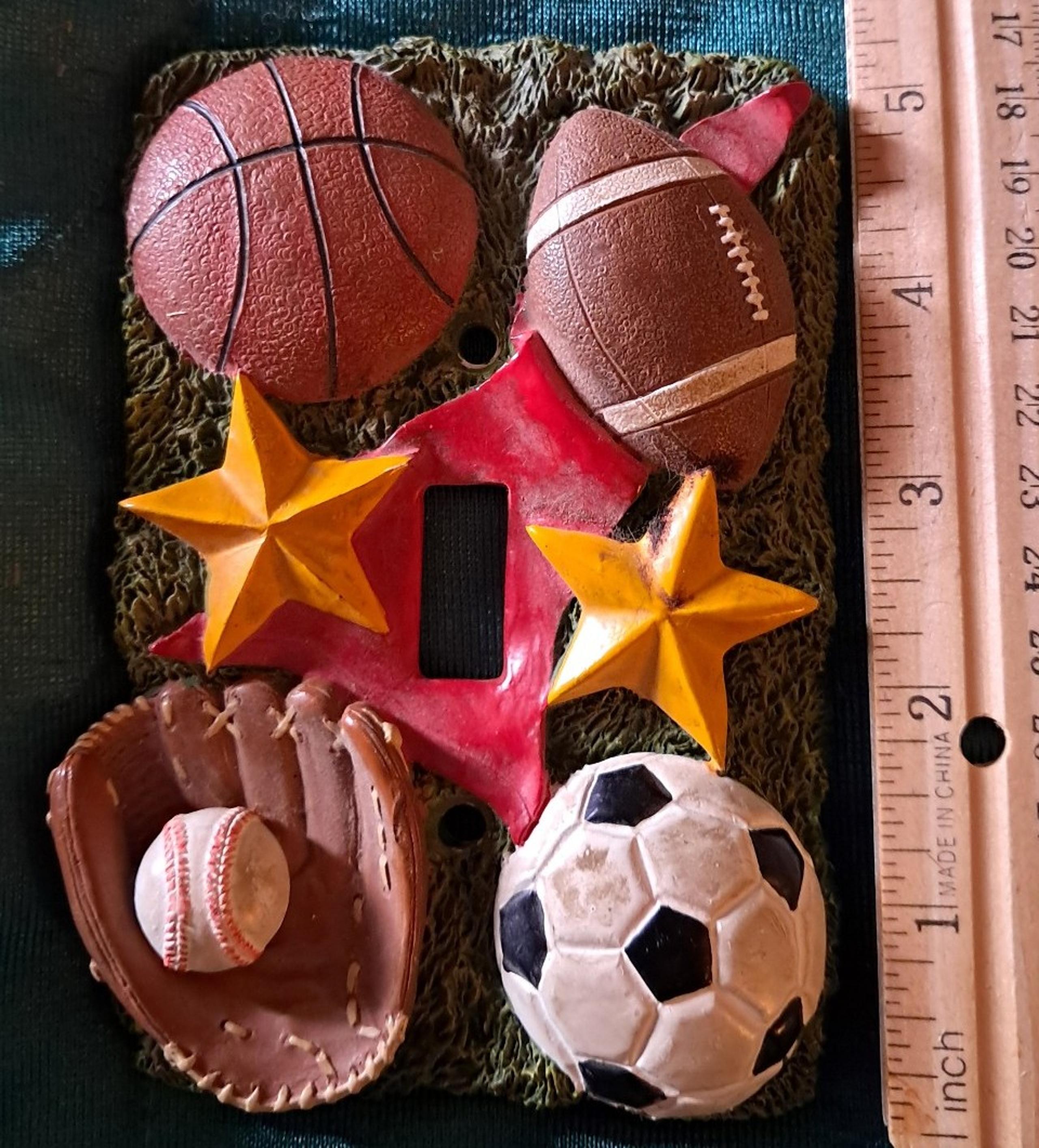 Vintage sports themed light switch cover