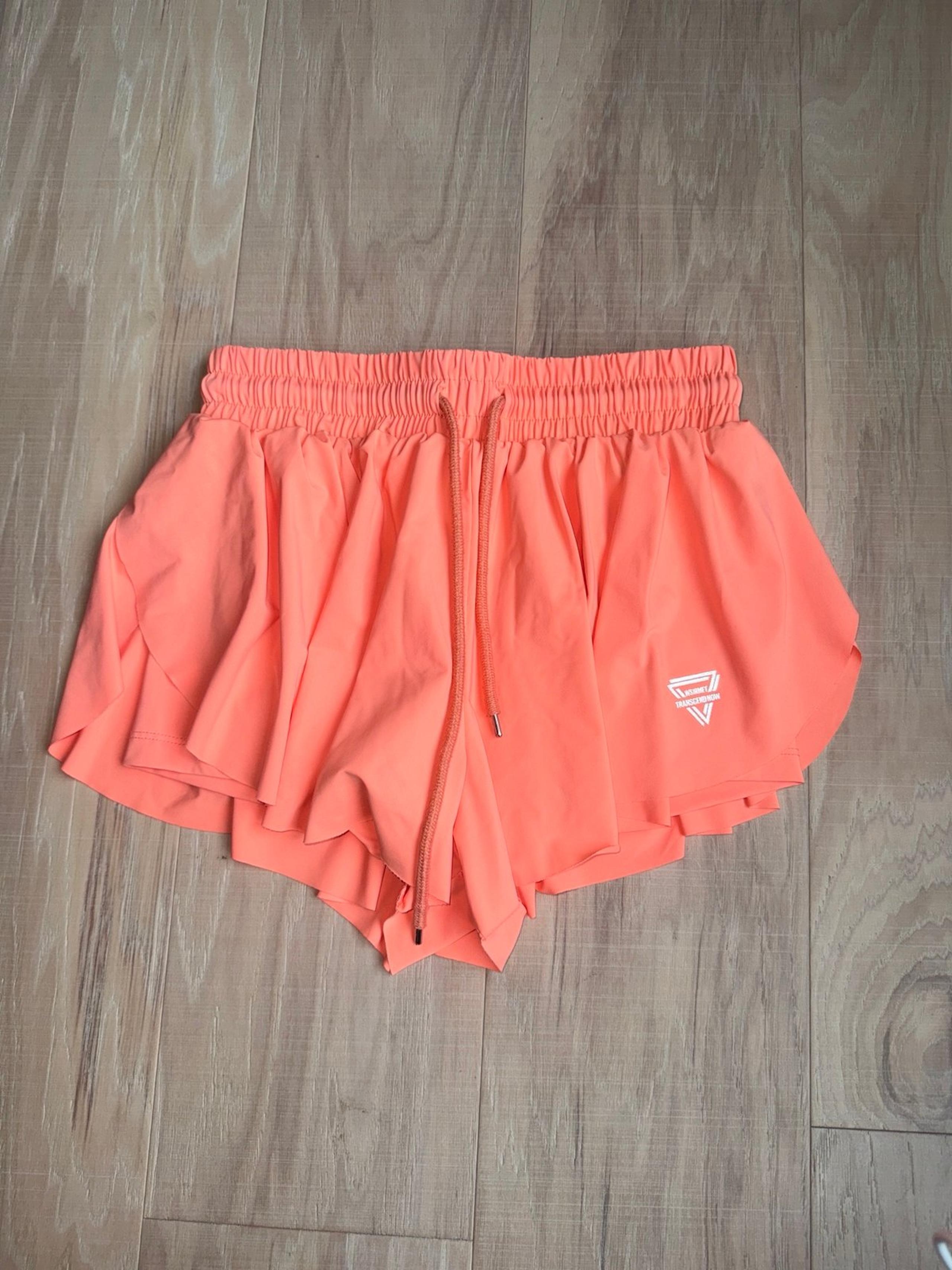 Neon orange flowy butterfly Shorts
