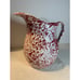 Red and white speckle Enamelware pitcher