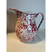 Red and white speckle Enamelware pitcher