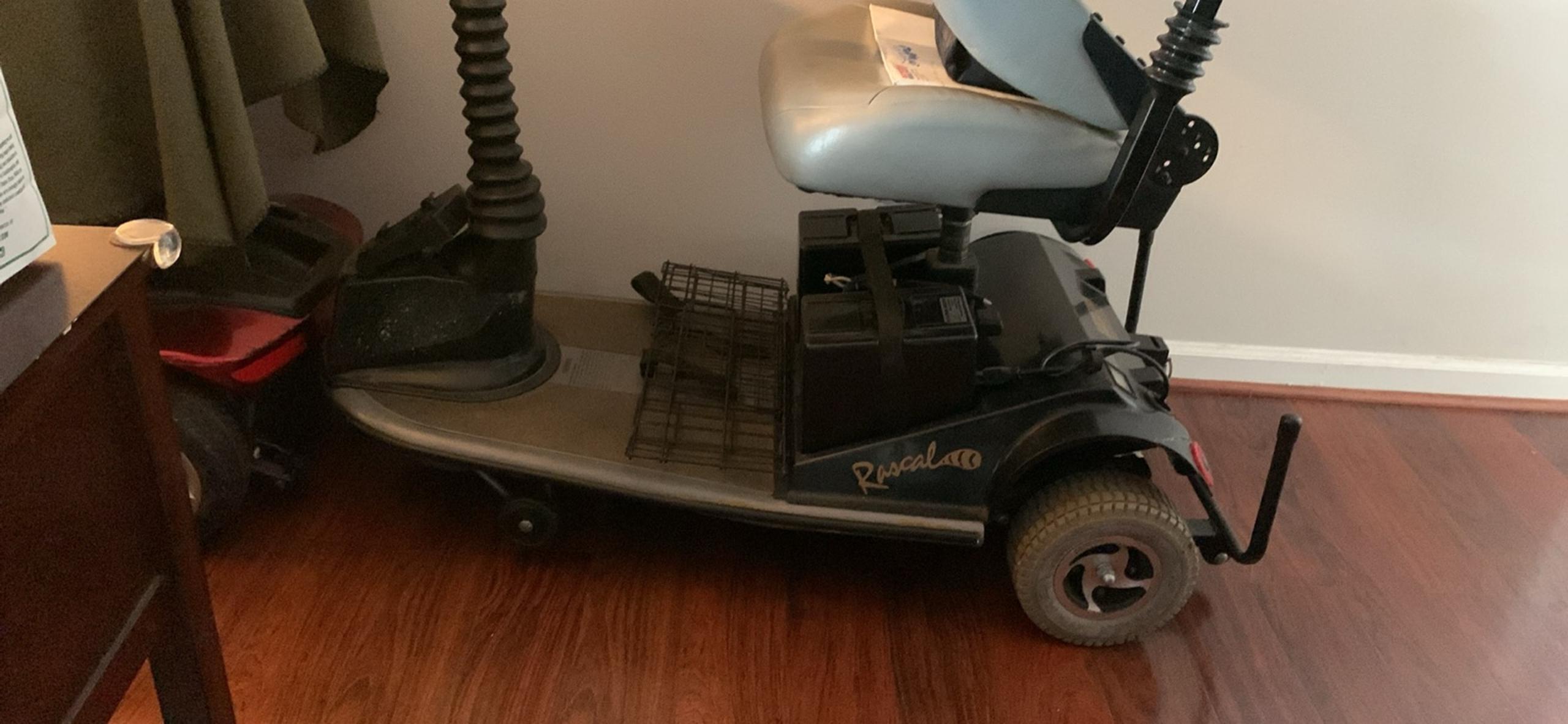 Rascal Handical mobility scooter  with elevating power seat