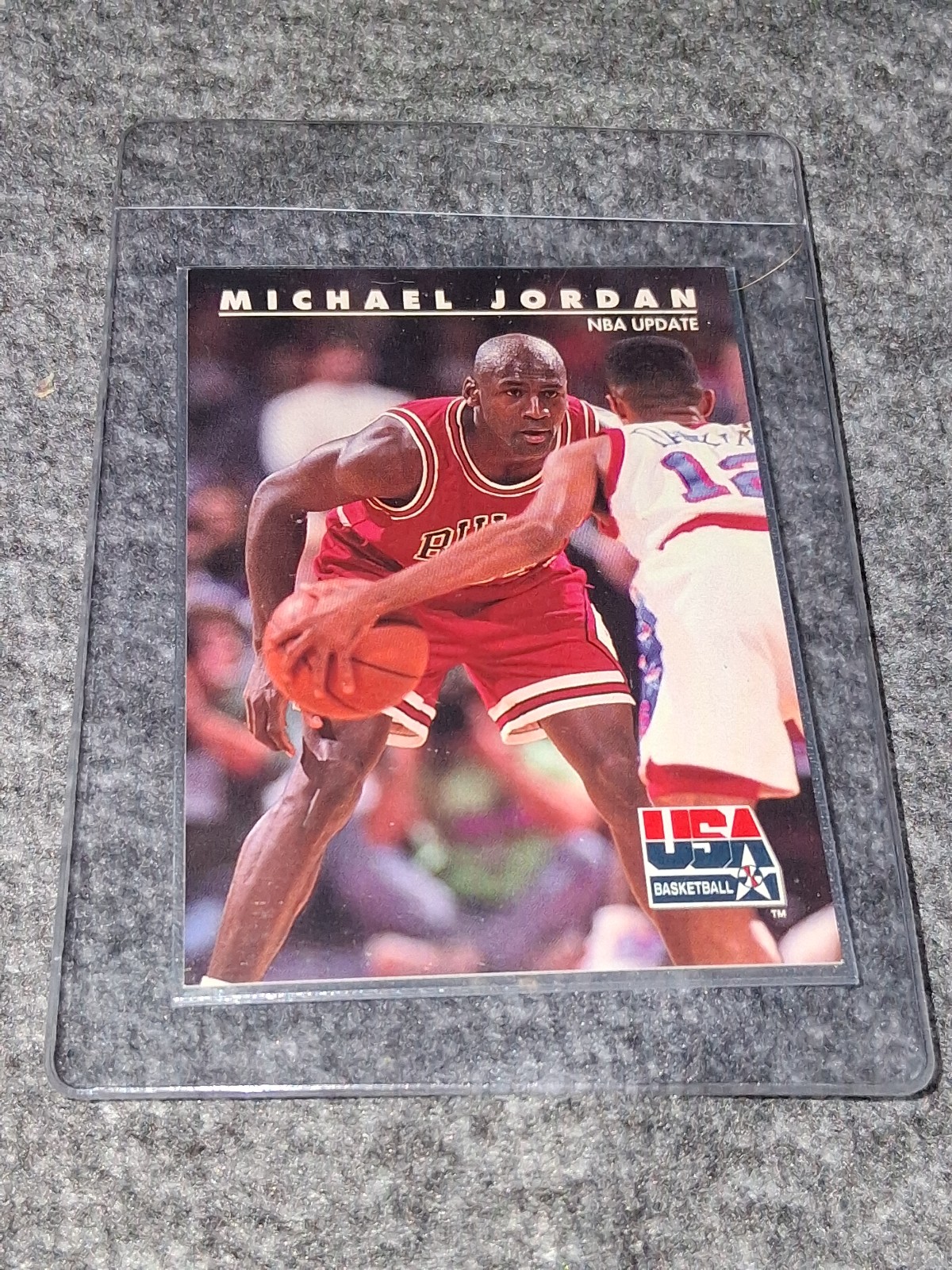 Jordan basketball cards and a dollar bill