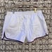 Vintage white with red and blue trim shorty basketball shorts LARGE