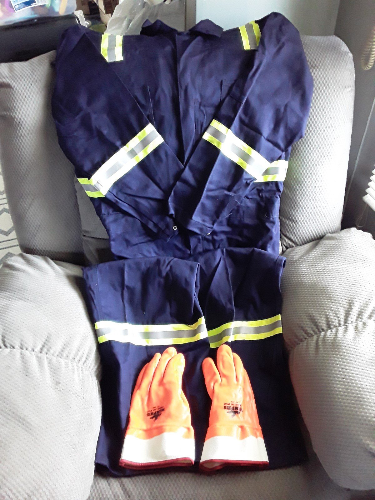 Flame resistant coveralls + gloves.