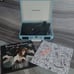 crosley record player with 2 vinyls