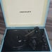 crosley record player with 2 vinyls