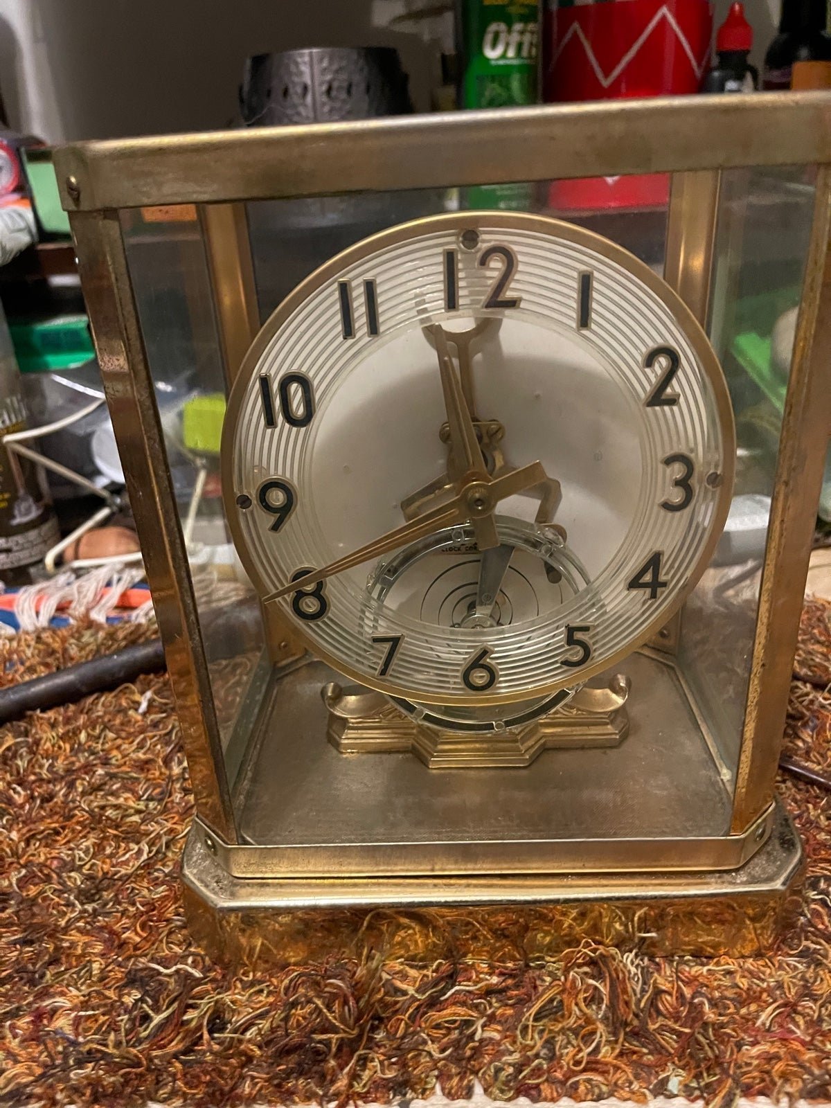 GLASS CASED ELECTRIC UNITED MECHANICAL CLOCK