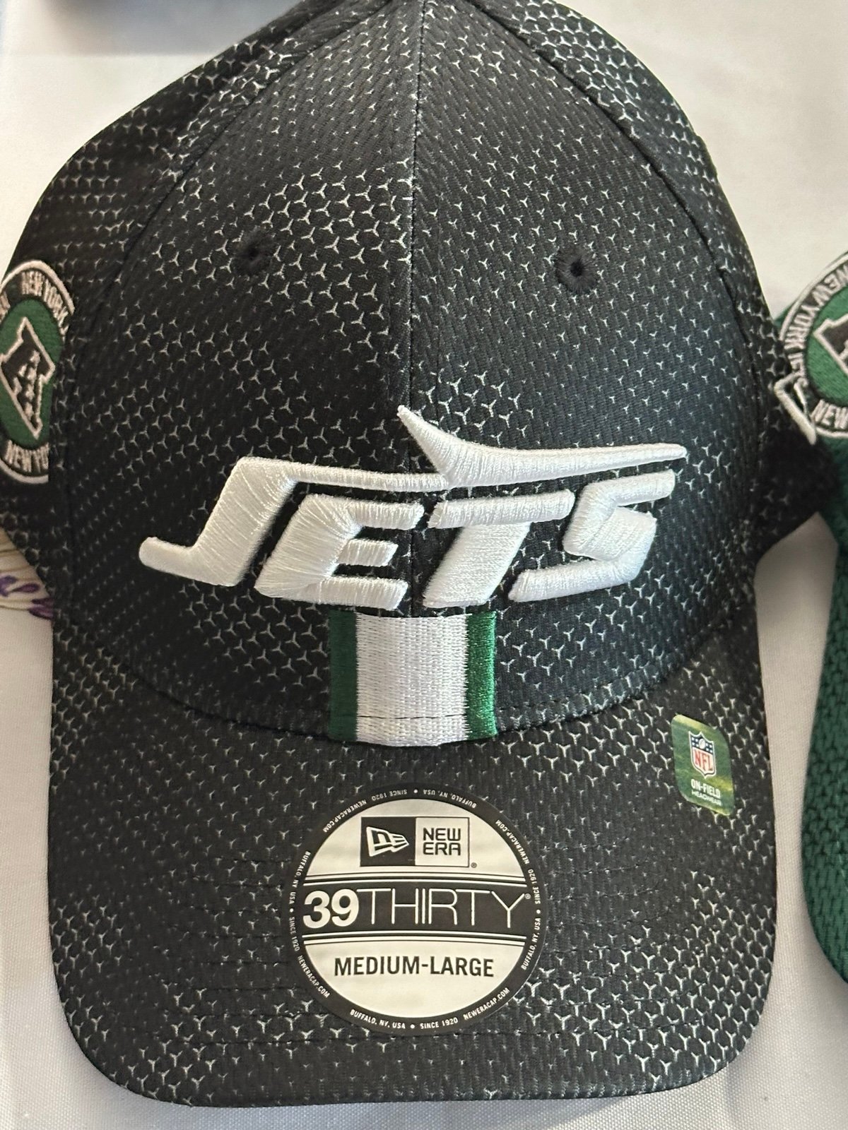 2 New York Jets 3930 flex fit hats. Size M/L brand new, never worn