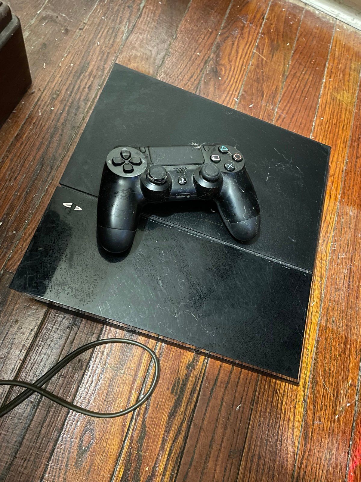 PlayStation 4 with one controller
