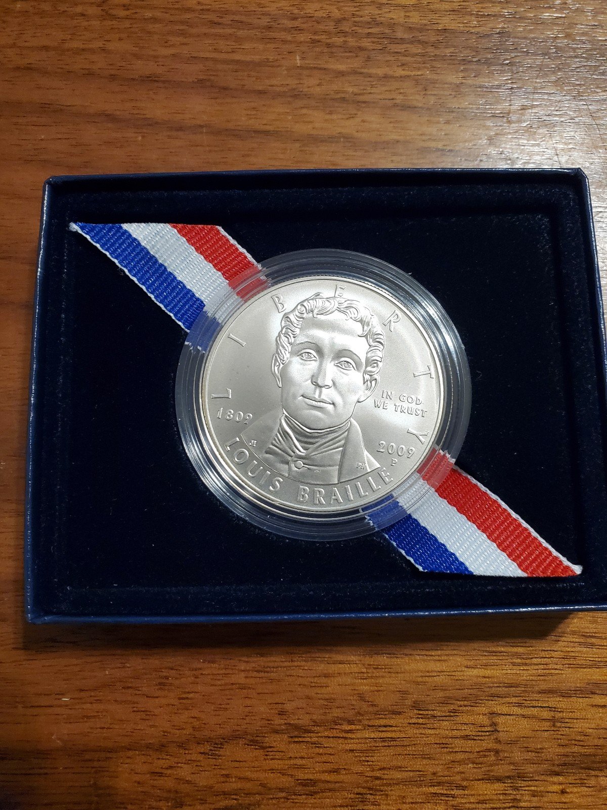2009 Louis Braille Silver Dollar