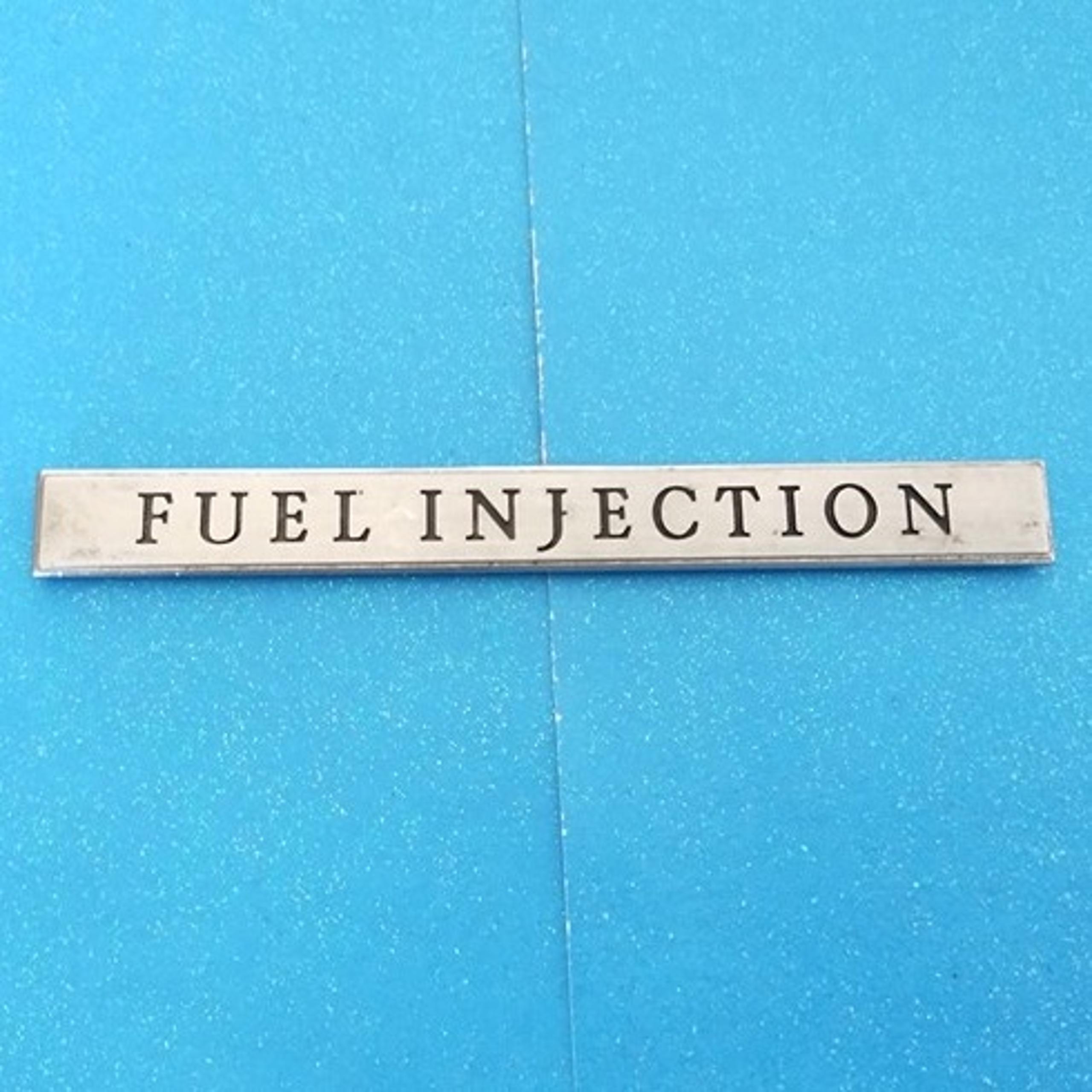 1980's Cadillac Seville / Eldorado / Deville etc. Fuel Injection metal emblem
