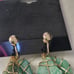 Antique gold wire wrapped jade earrings