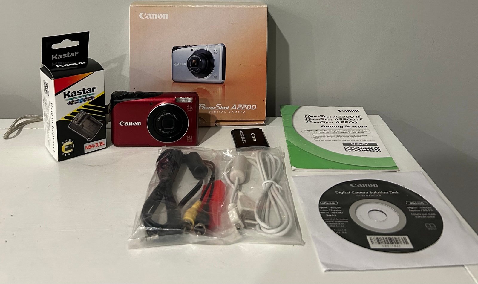 Canon PowerShot A2200 HD 14.1MP Digital Camera Red New Charger Bundle Tested