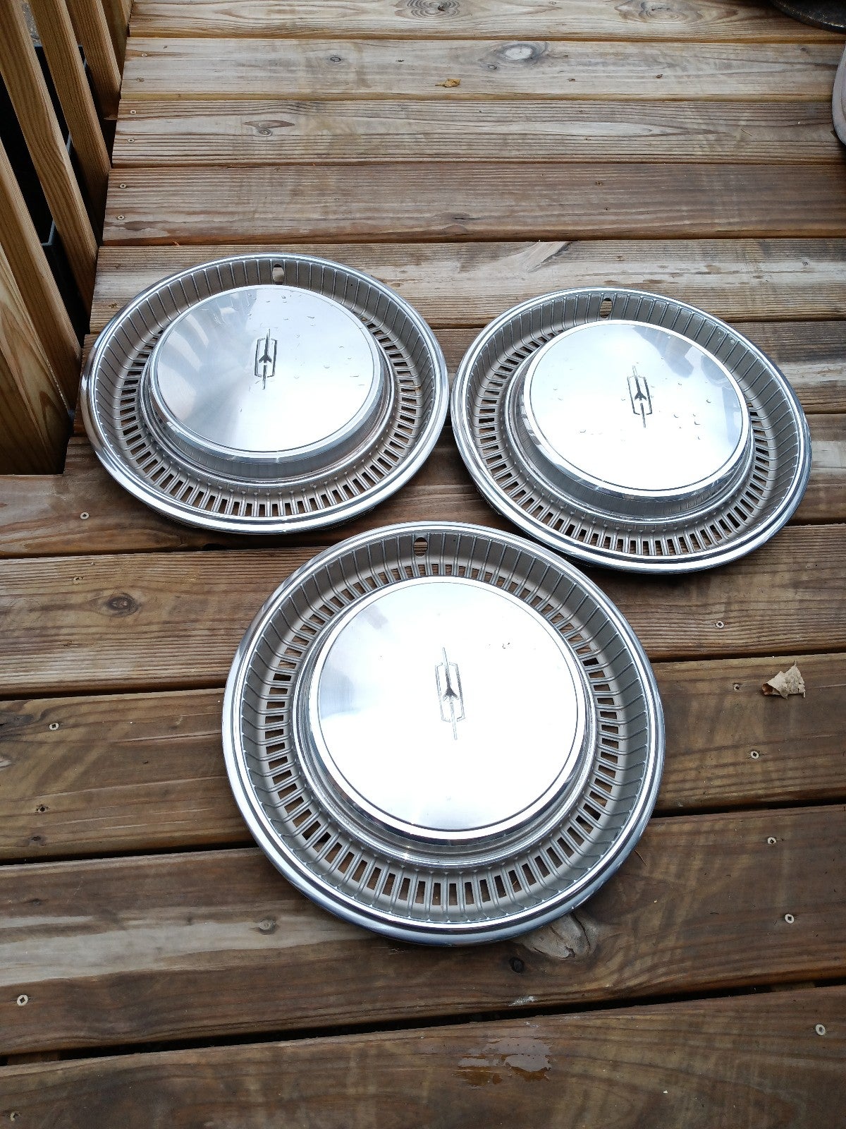 3-15 Oldsmobile Delta 88 hubcaps