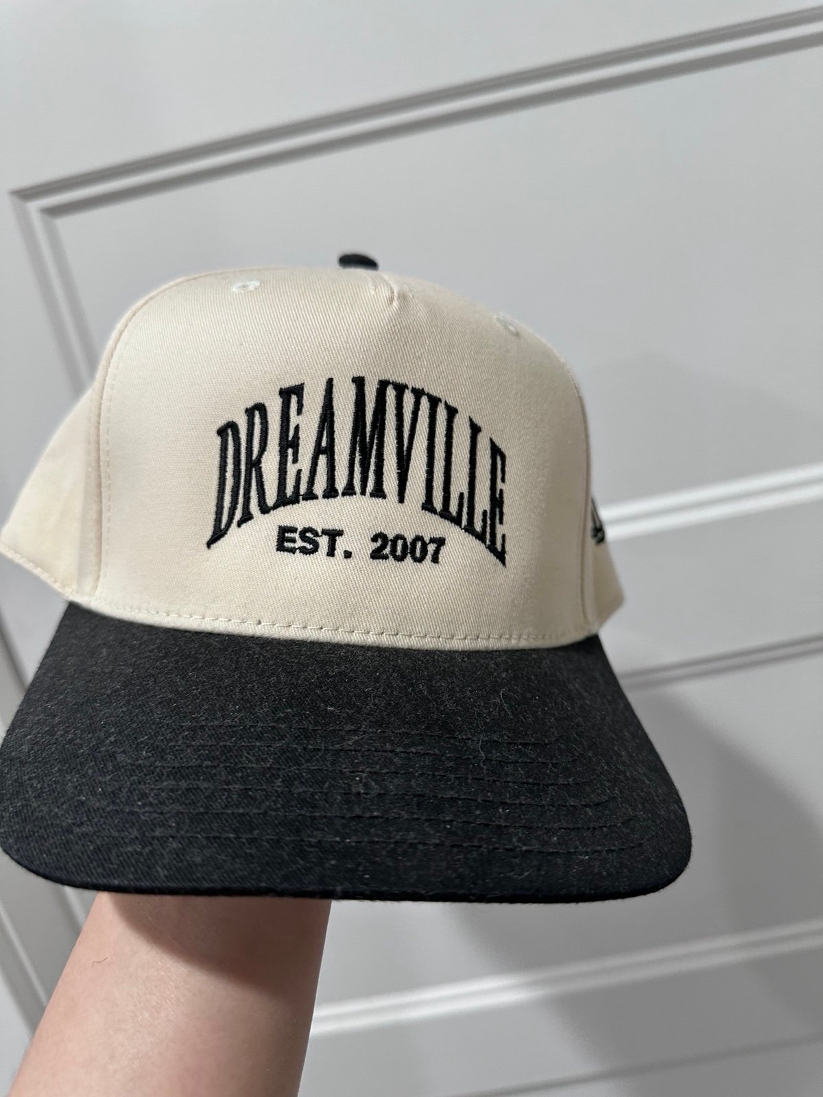 J Cole hat and Supreme hat