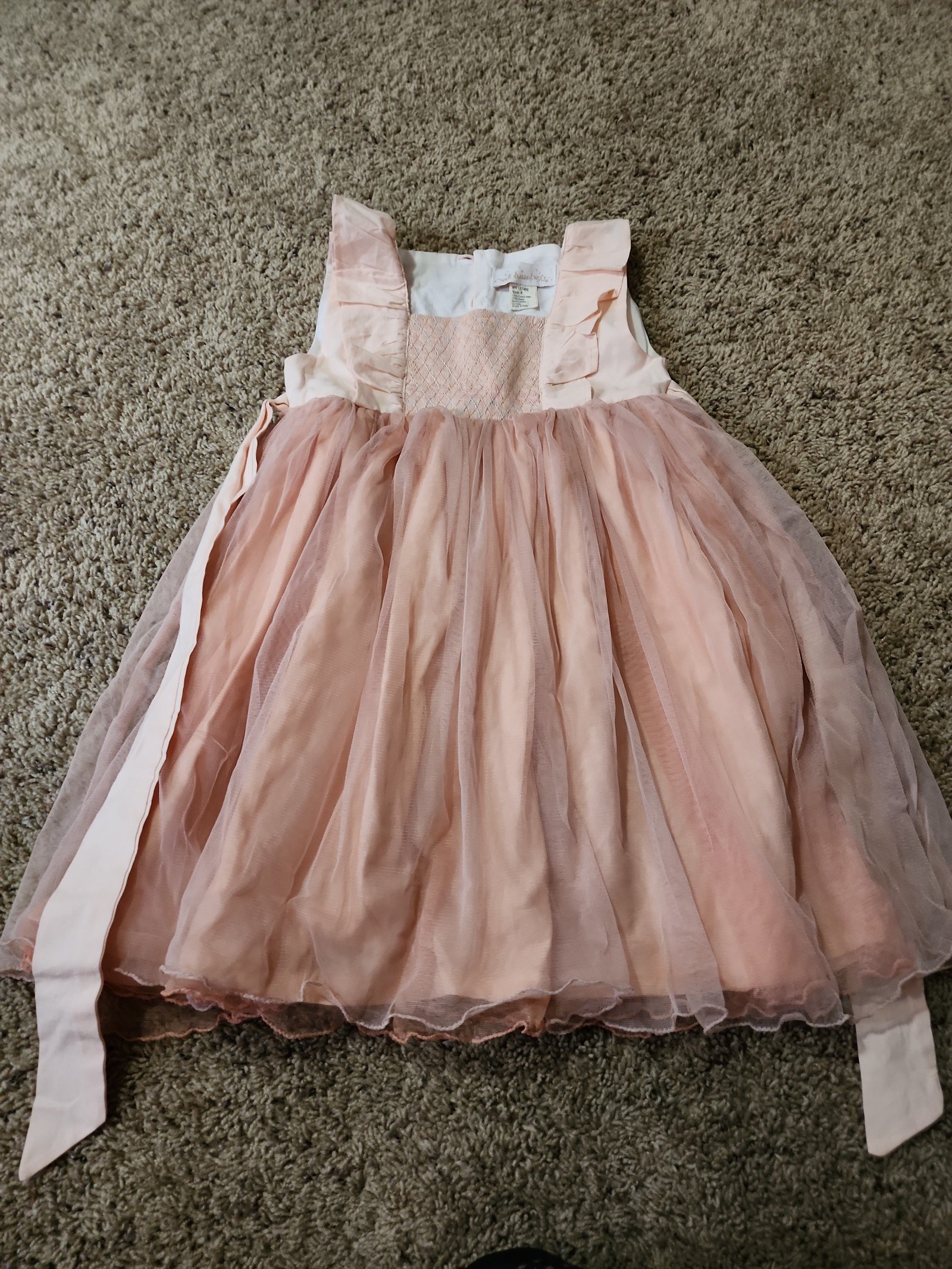 Well Dressed Wolf size 8 peach flutter