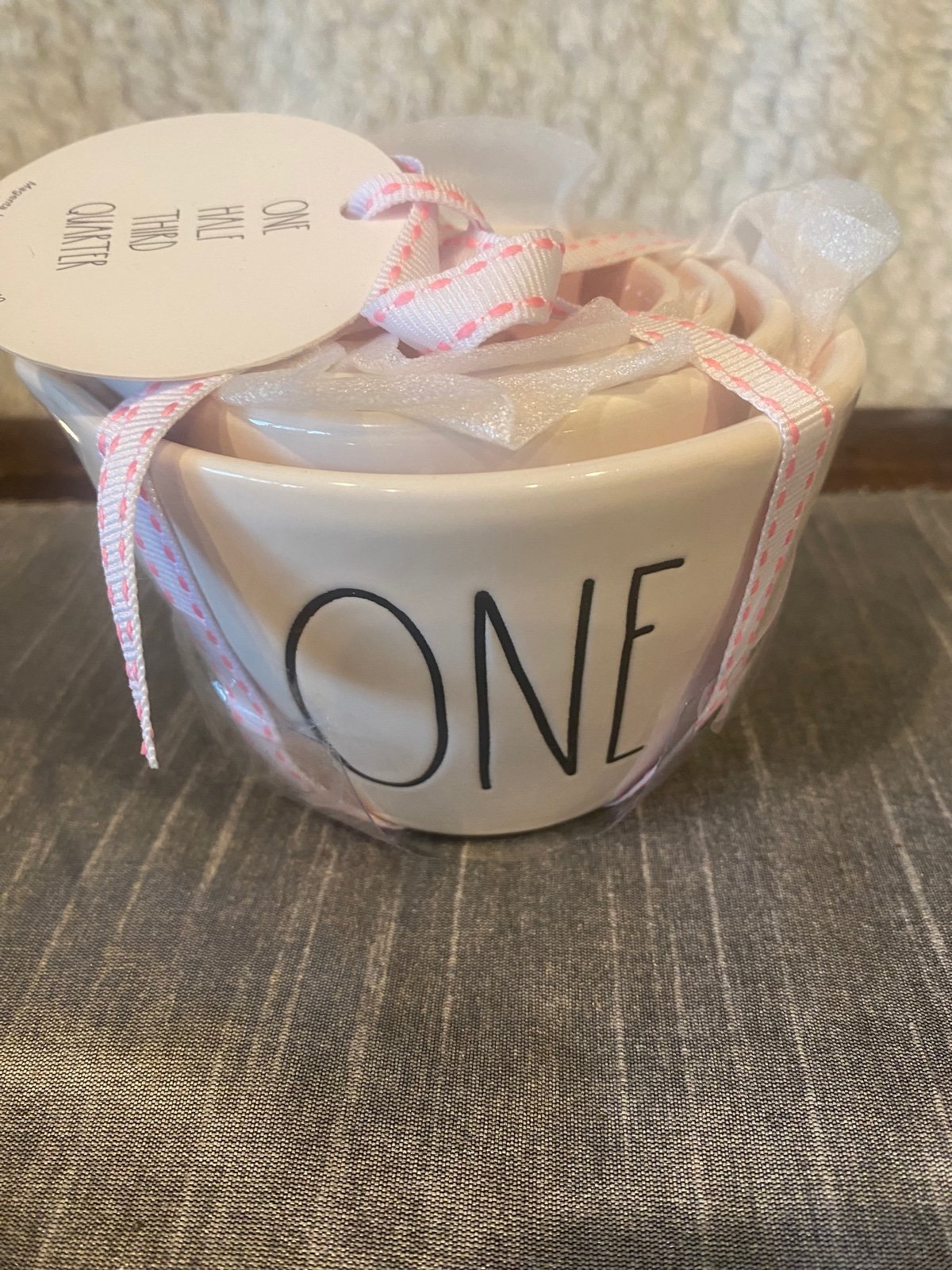 Rae Dunn white measuring cups with pink interior