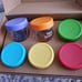 Glass baby food storage jars.