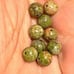 Lot of 44 6mm unikite beads. 242