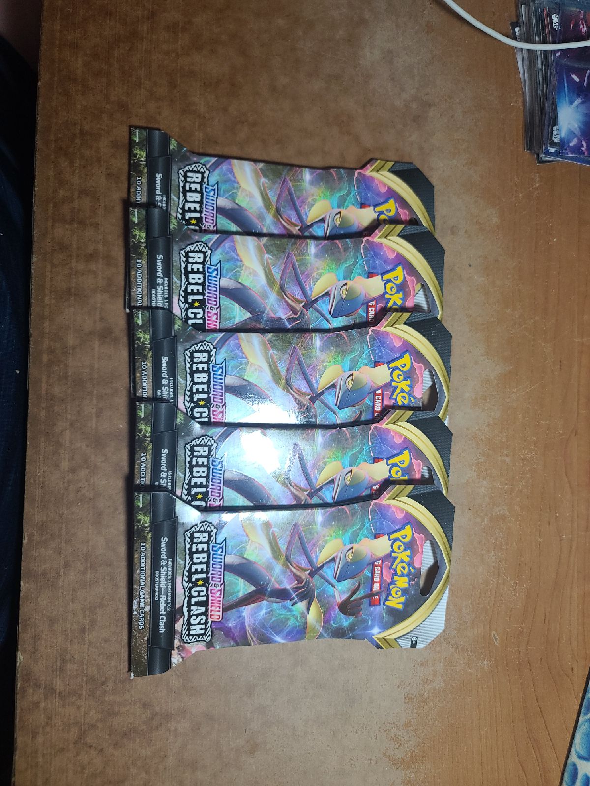 5 Pokemon Rebel Clash booster packs