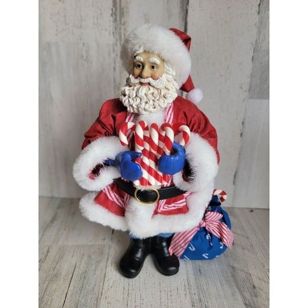Clothtique possible dreams Candy cane carry on santa claus xmas