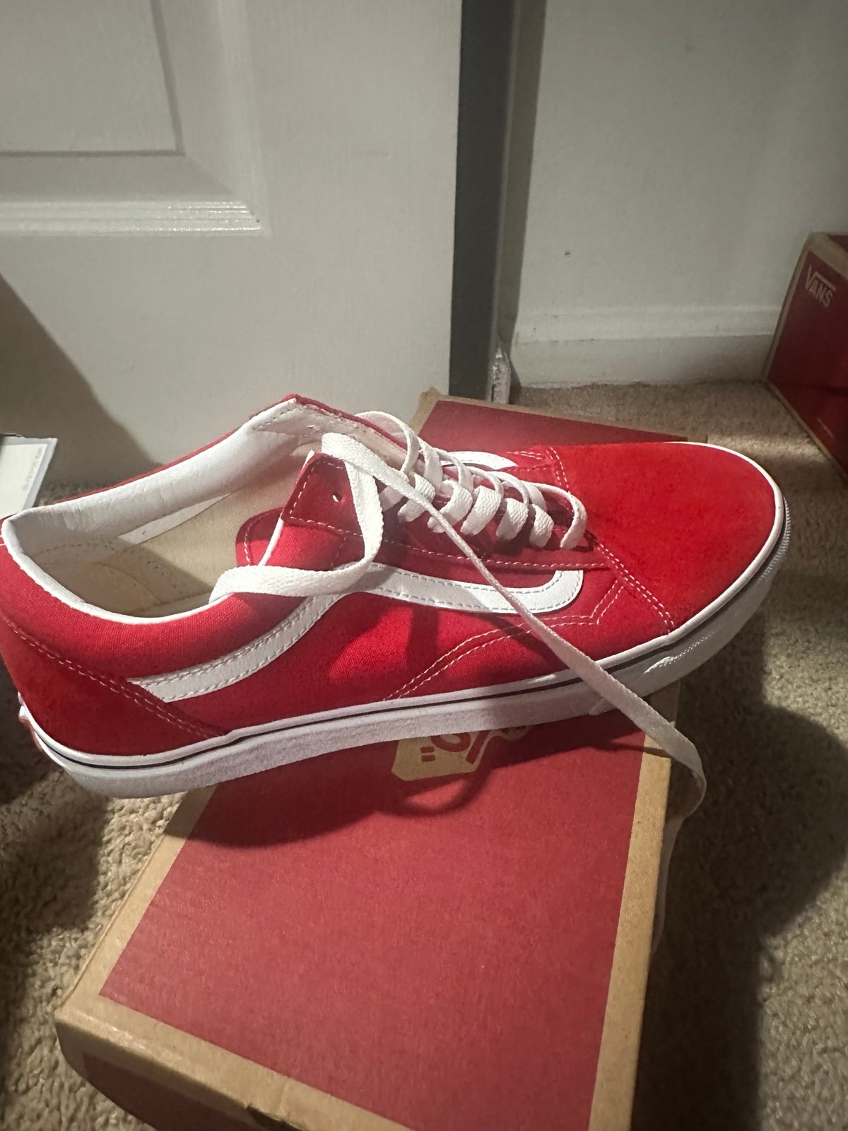 Men’s red low top vans