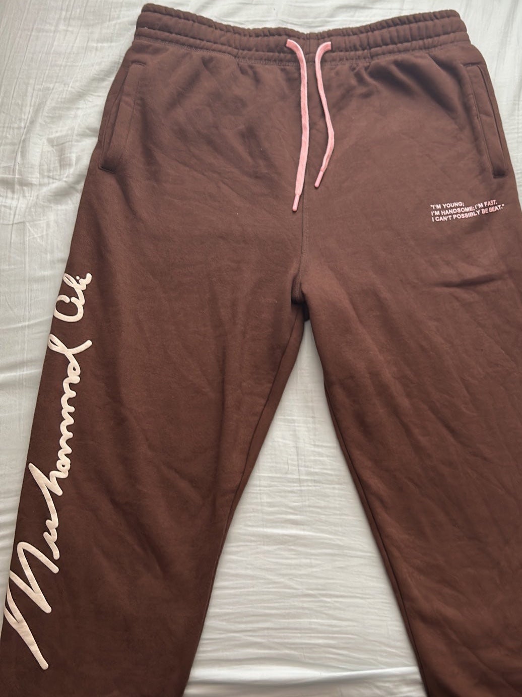 Muhammad Ali sweats from shoe palace
