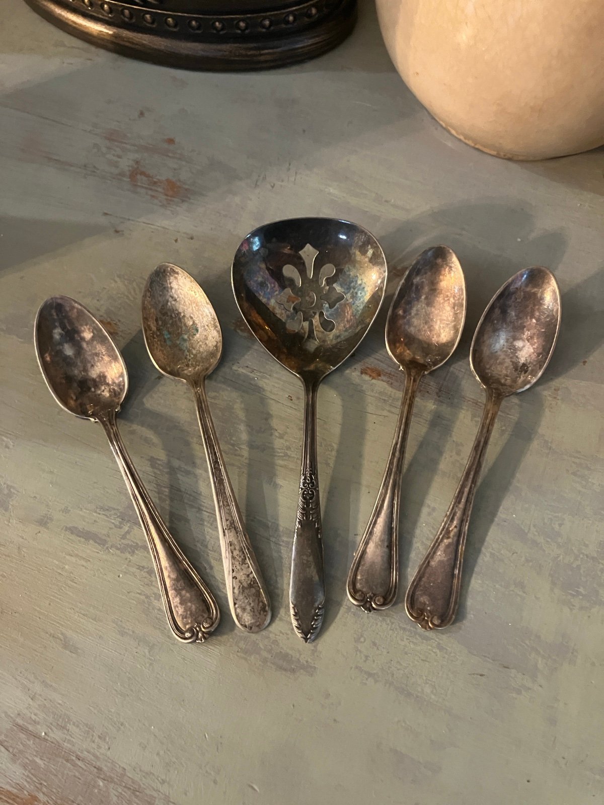 Cute set of antique tarnished decorative spoons