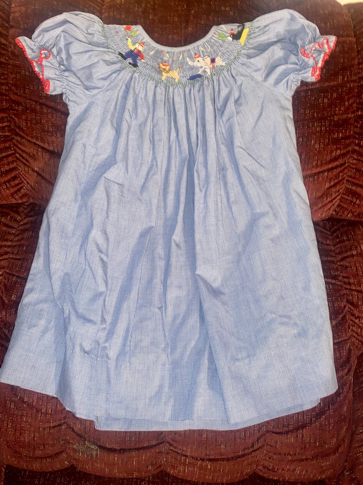 Amanda remembered smocked￼ circus dress