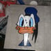 Donald Duck tile engraving