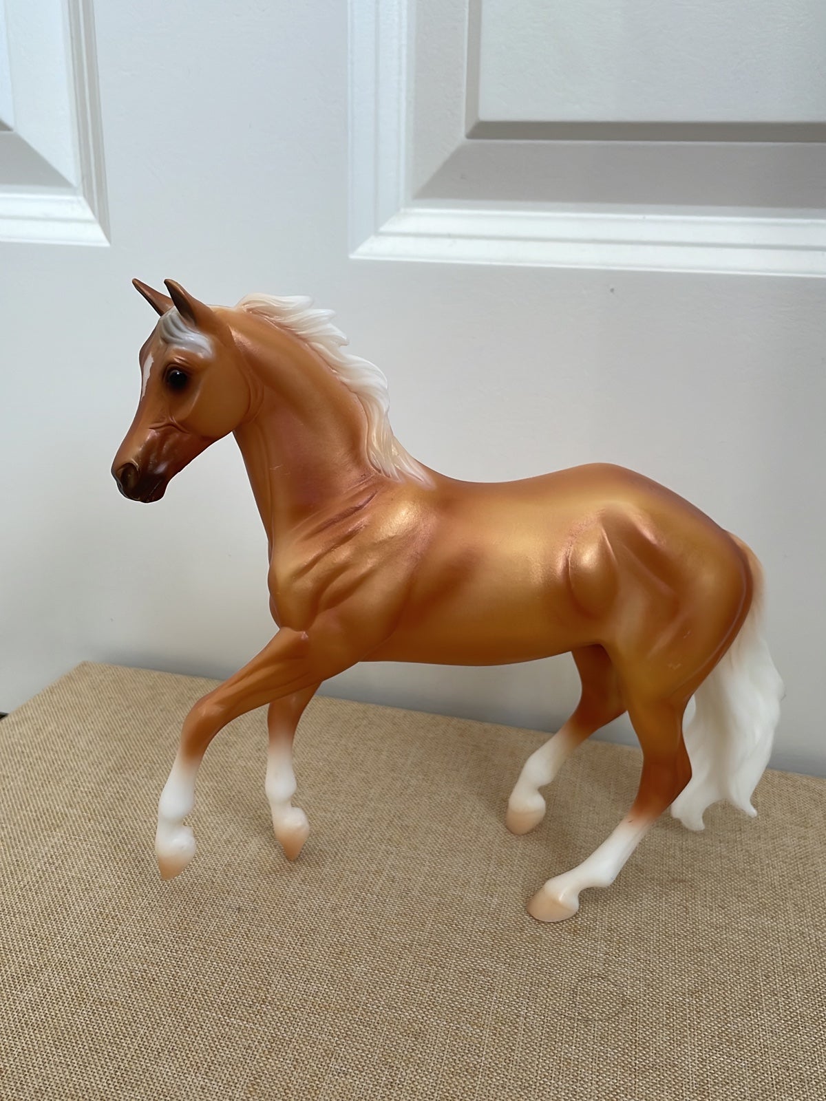 Golden breyer horse