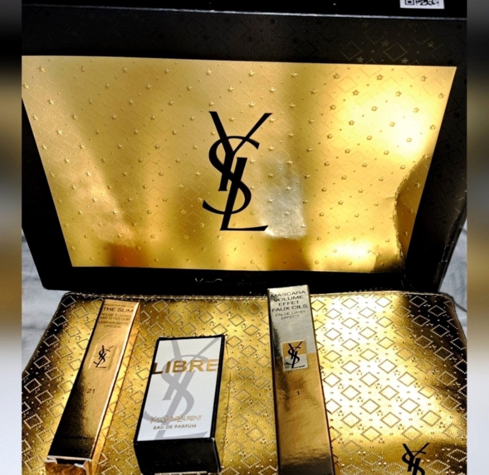 YSL must haves gld make up bag and gifts