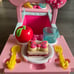 Figaro and a walk, Minnie's pet carrier, play kitchen set.