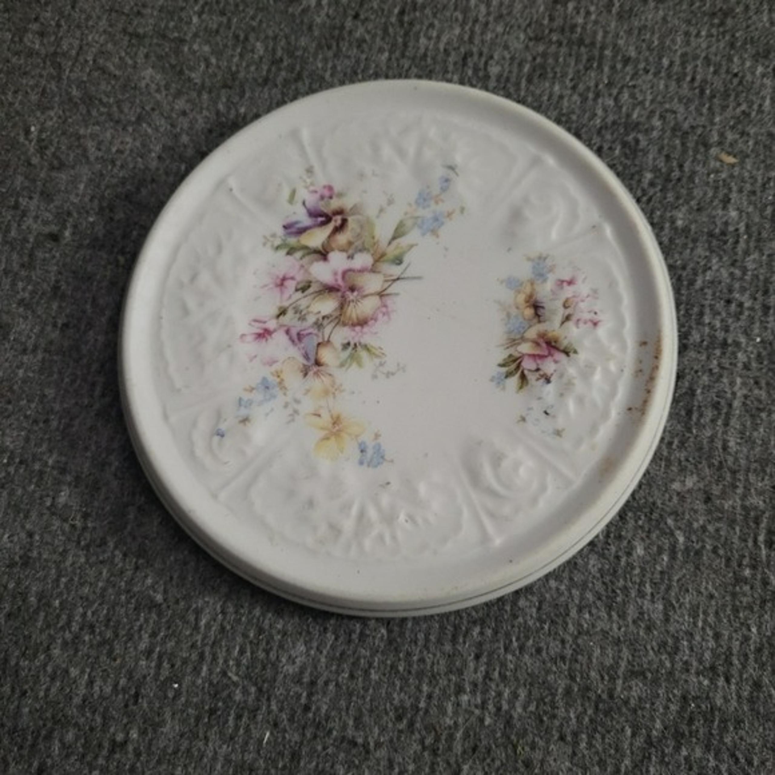 Floral Embossed White Ceramic trivet. Vintage