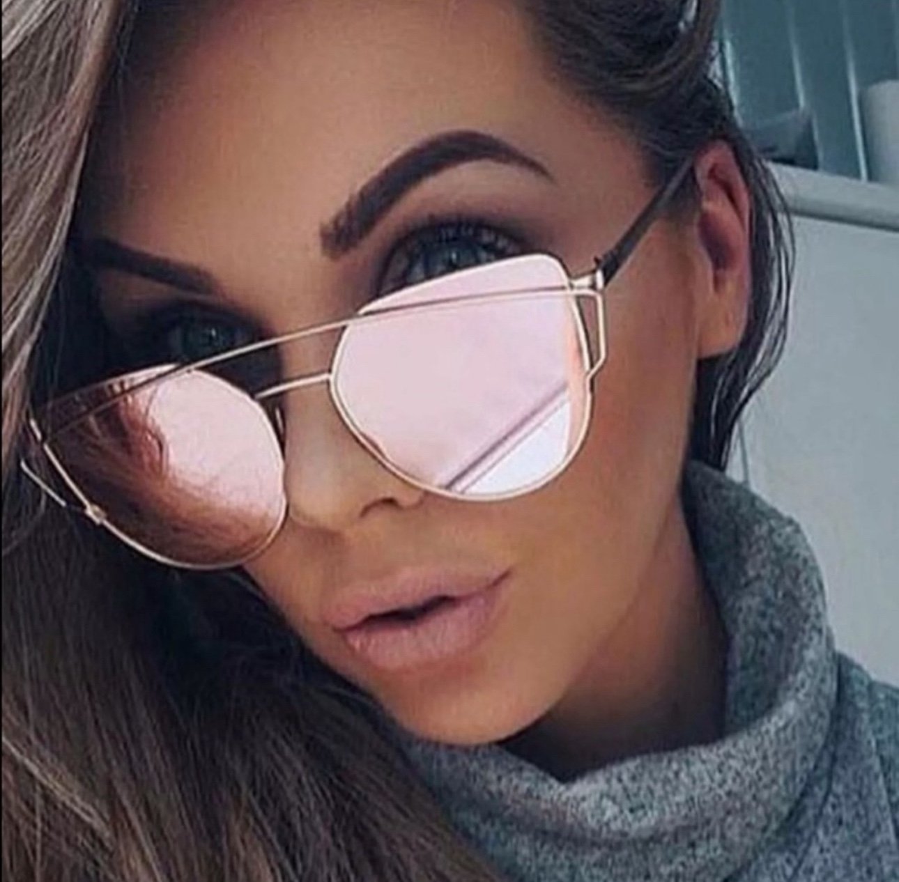 Rose Gold with gold hardware aviator style sunglasses